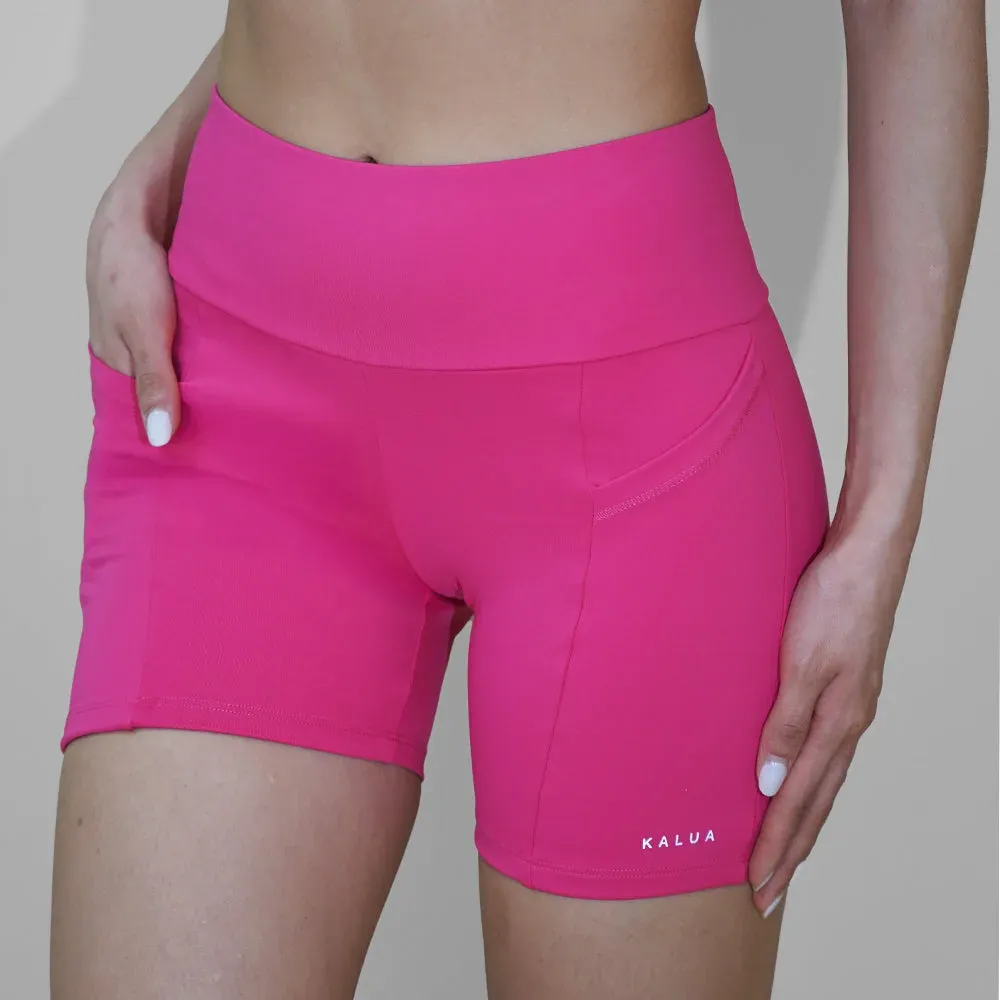 Ciclista corto de súplex con bolsillos, color fucsia